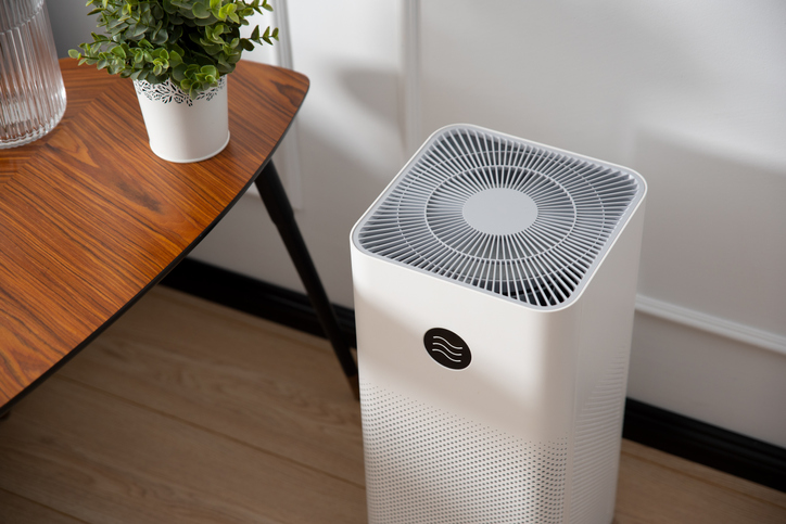 Air purifier in living room, dust protection