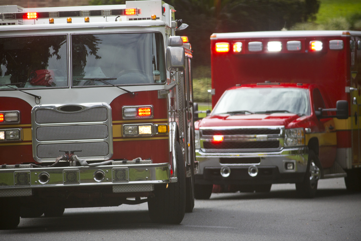 Ambulance and Firetruck in a residential neighborhood