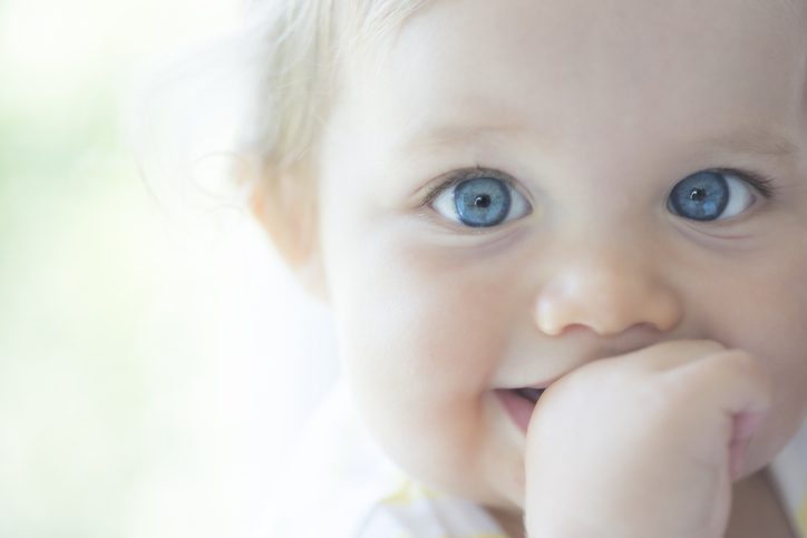 Cute baby with big blue eyes