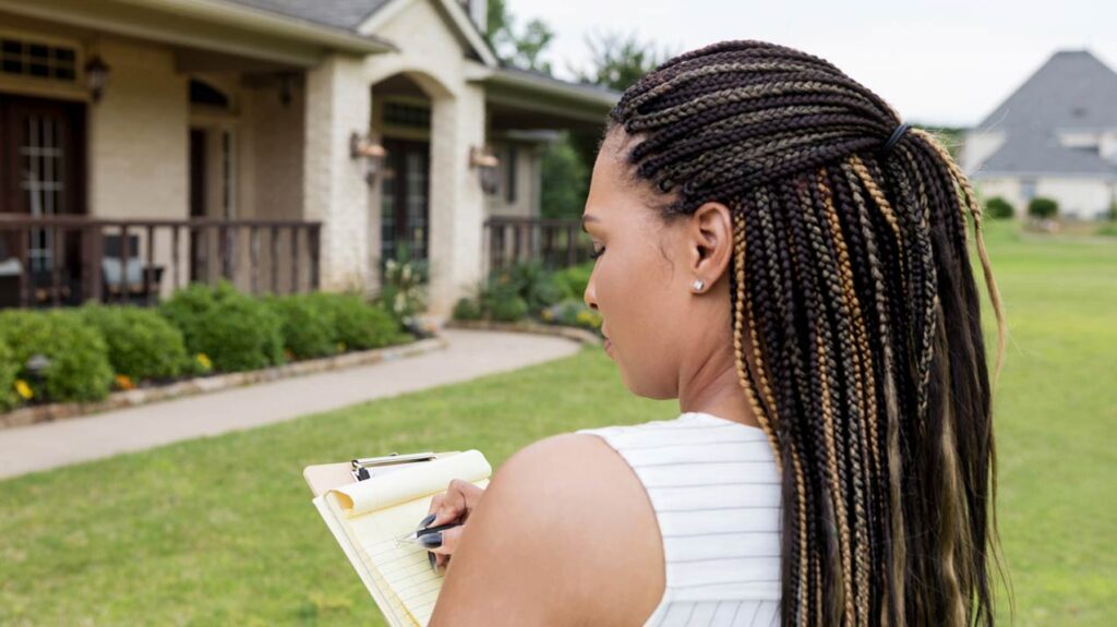 Home owner inspecting home for warranties 